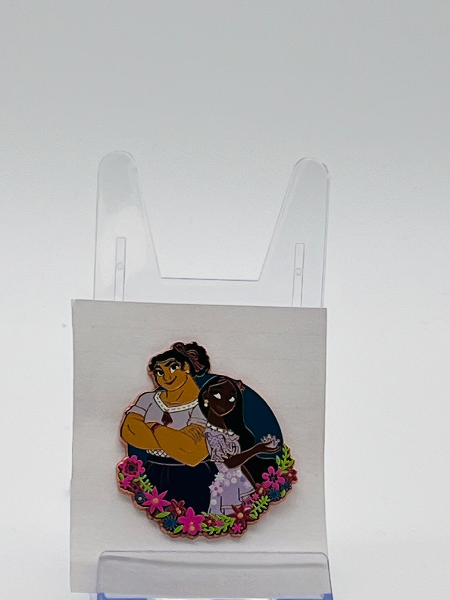 Disney Parks Encanto Booster Set Pin featuring Luisa and Isabela.