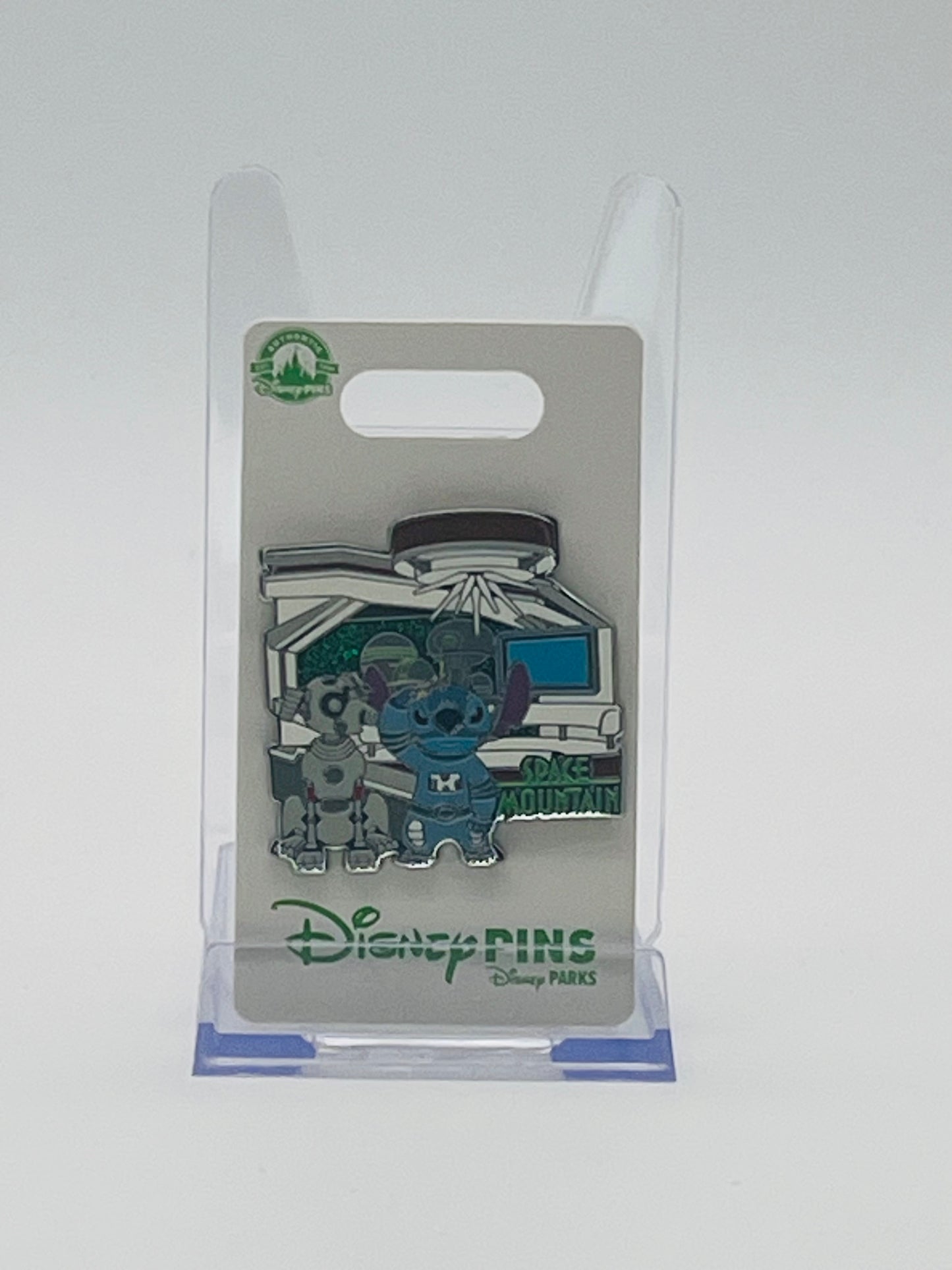 This is the official Disney Parks Open Edition trading pin featuring Stitch and Nipper the Robot Dog at Space Mountain