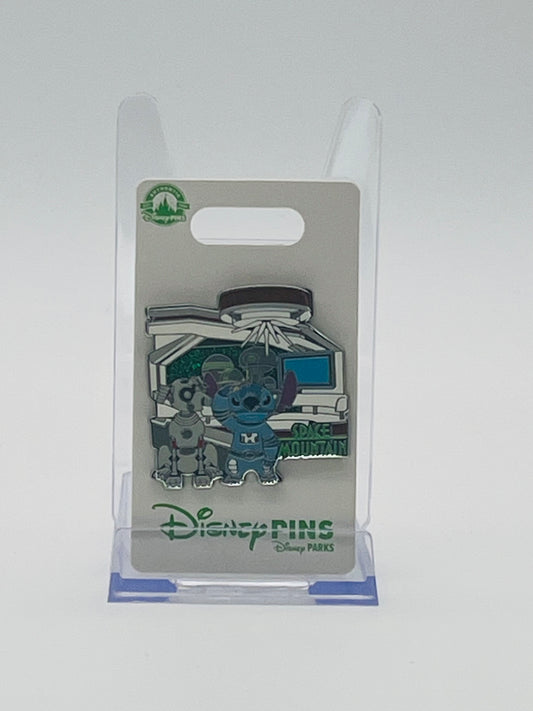 This is the official Disney Parks Open Edition trading pin featuring Stitch and Nipper the Robot Dog at Space Mountain