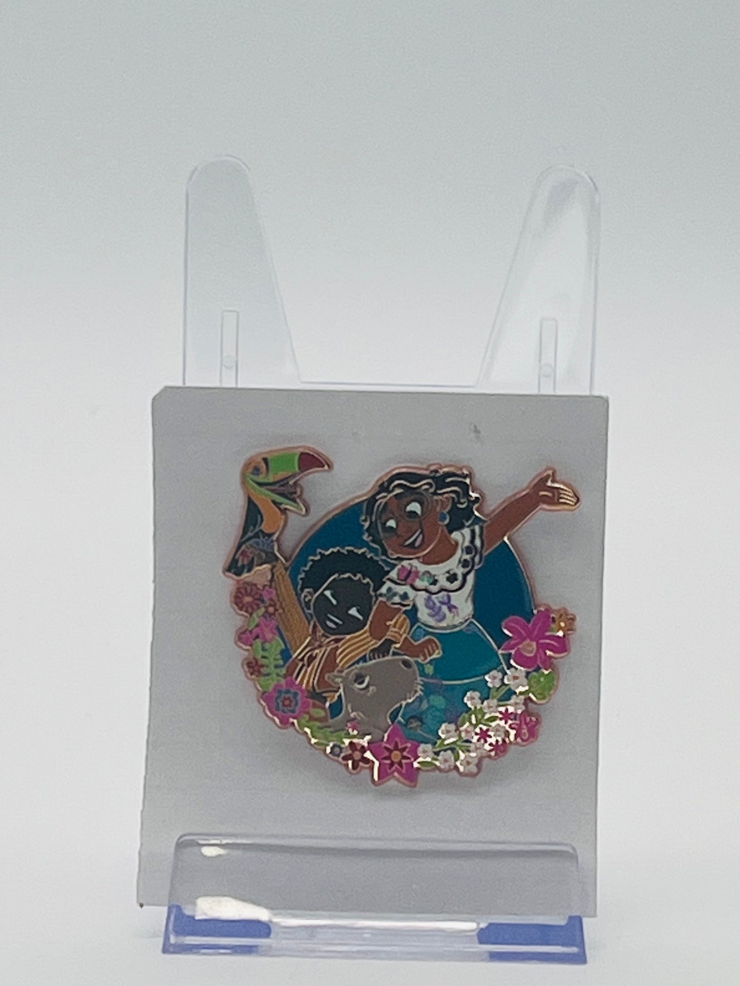 Disney Parks trading pin featuring Mirabel, Antonio, Pico, and Chispi from Disney’s Encanto