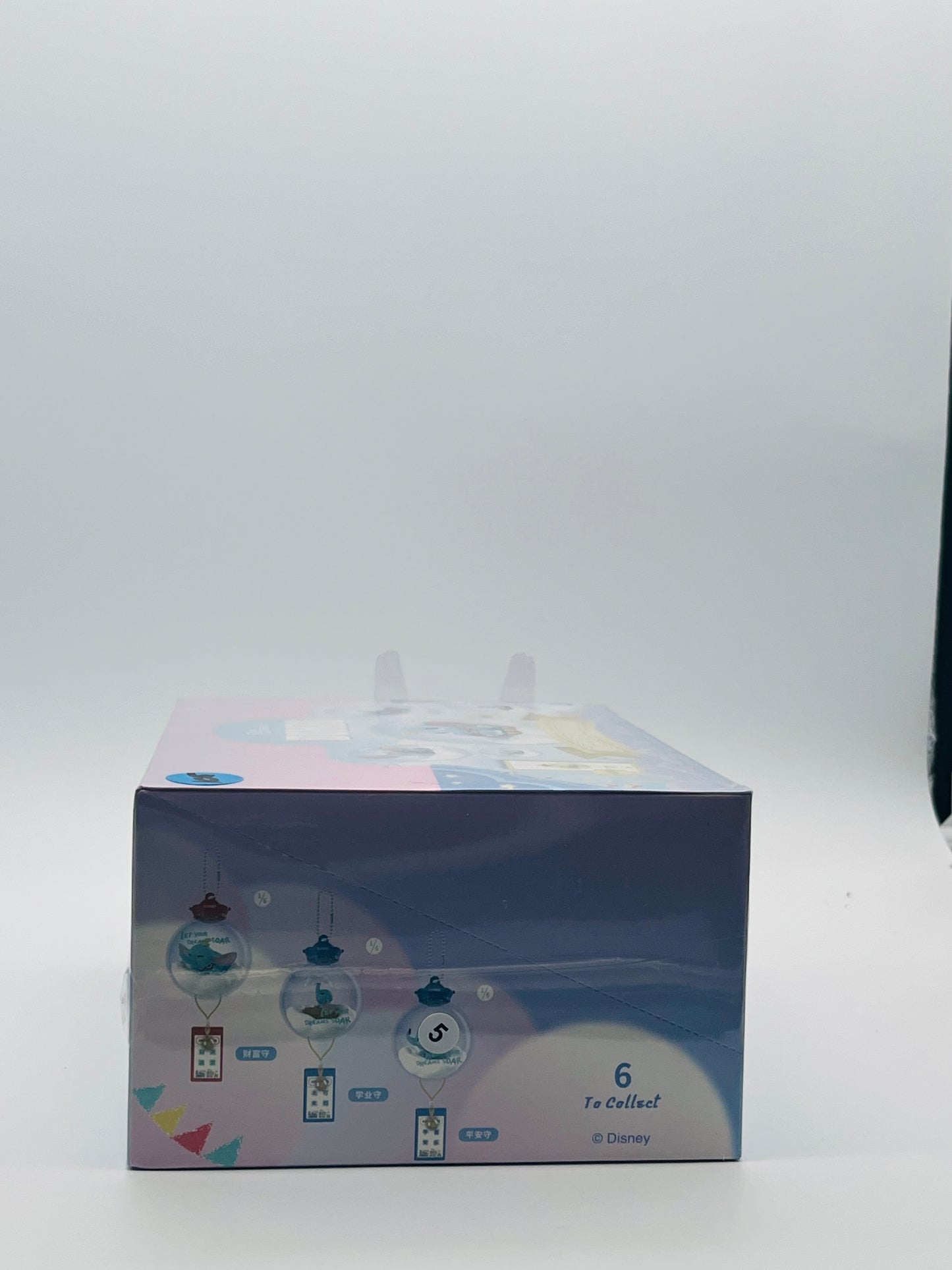 factory-sealed master display case of the Lioh Toy Disney Dumbo "Wishing Wind Chime Crystal Ball" Series Blind Box