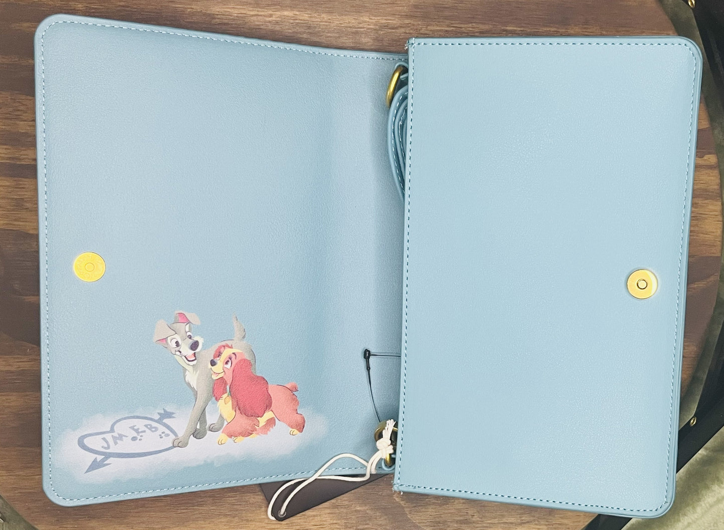 Loungefly Disney Lady and the Tramp Classic Book Convertible Crossbody Bag.